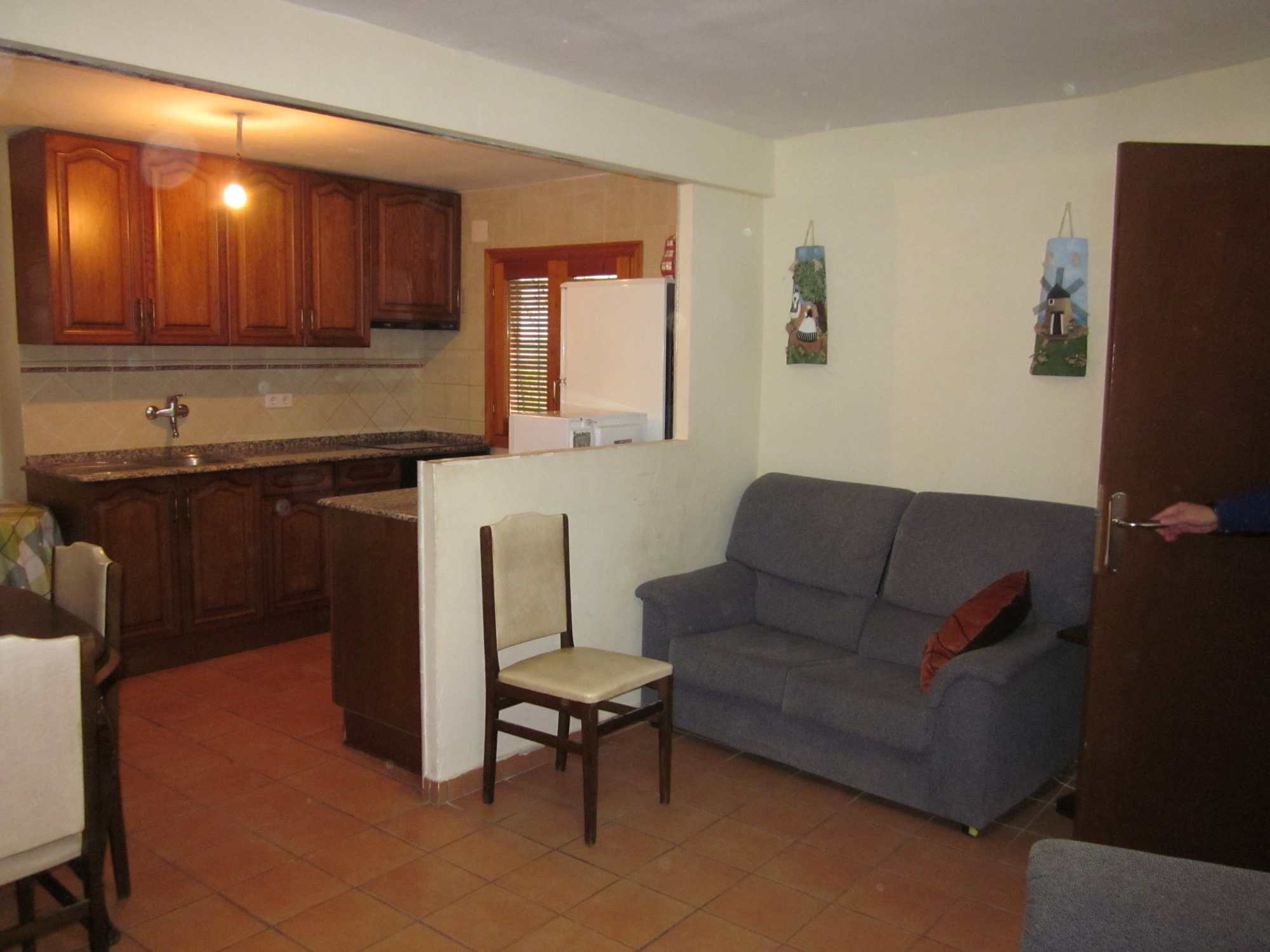 Salon-cocina-min Casa adosada de pueblo para ALQUILER en Colungo