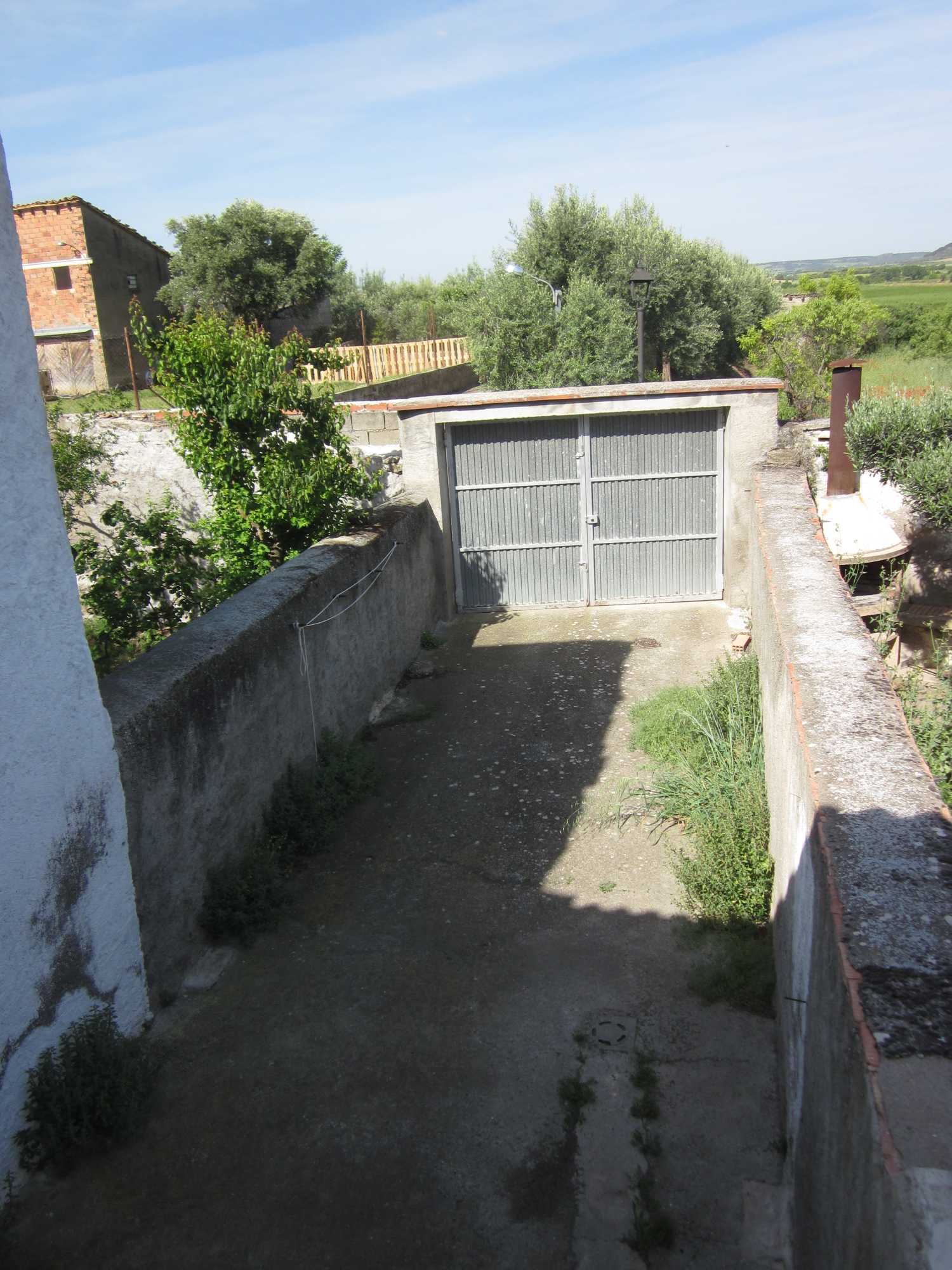 ENTRADA TRASERA-min Casa amueblada en Salas Bajas